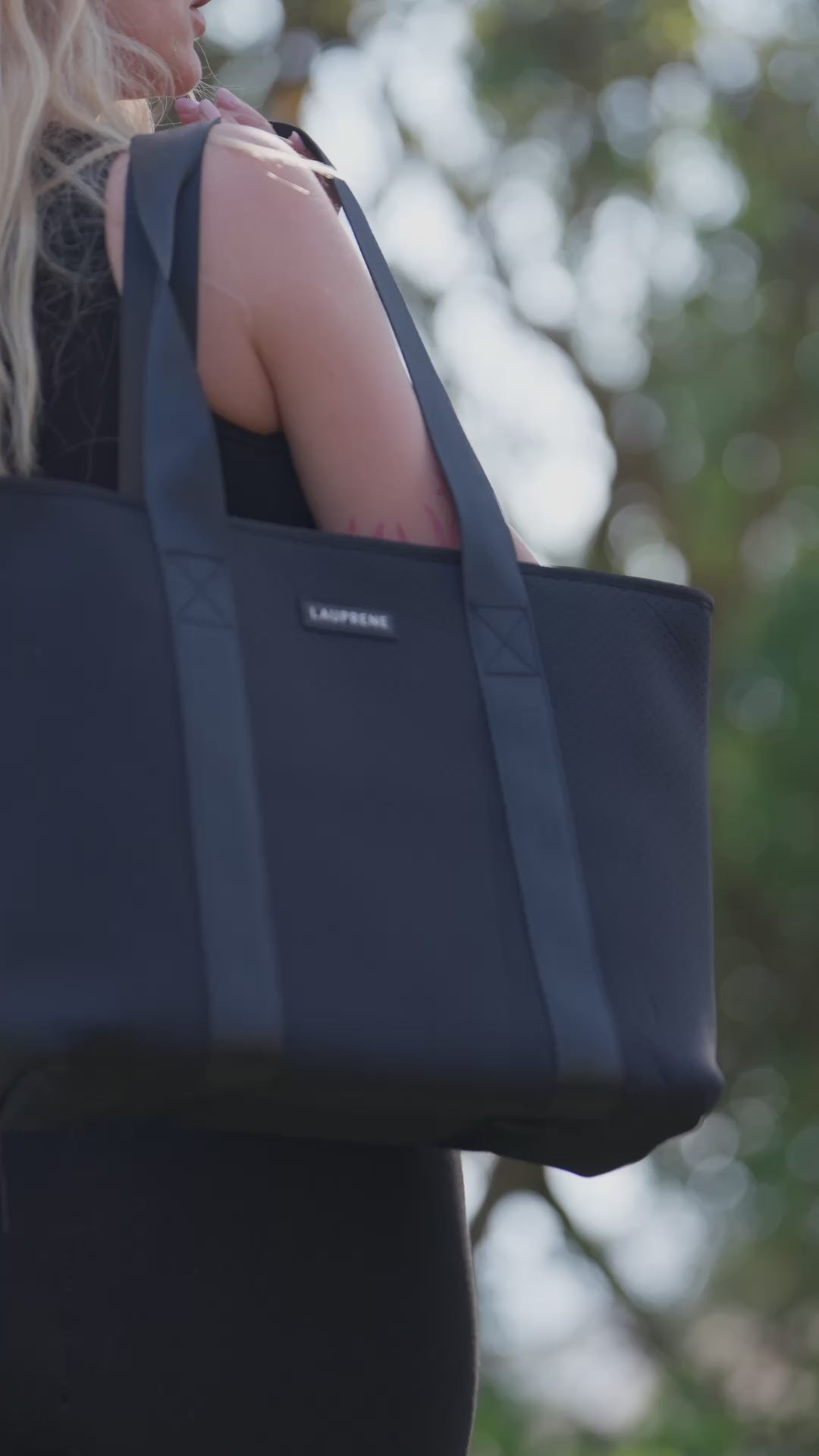 Urban Black tote with Carla Orr in her gym kit in the forest