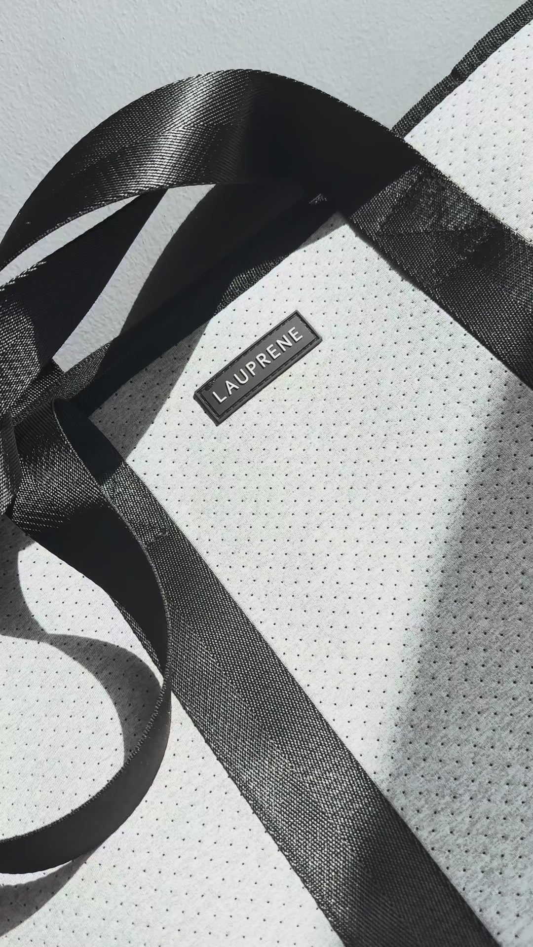 Urban Grey neoprene tote bag showing the quality of the fabric on a studio floor.